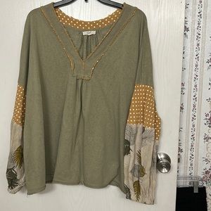 Adorable green and floral top